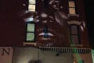 Kanye West Premiered His “New Slaves” Video On A Wall in Brooklyn (Video)