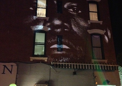 Kanye West Premiered His “New Slaves” Video On A Wall in Brooklyn (Video)