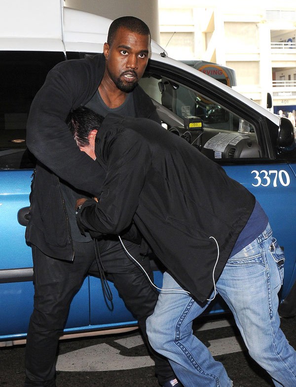 kanye-west-fight-ffn-ftr Kanye West Flexes On Yet Another Paparazzi (Video)  