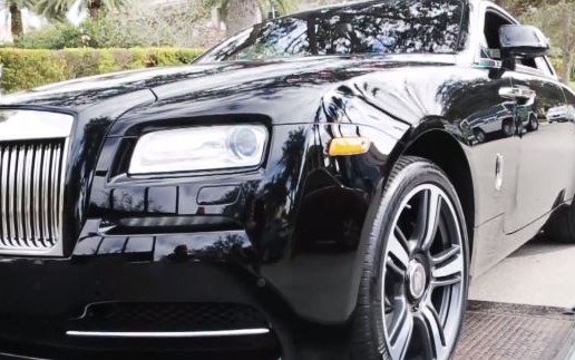 Rick Ross Buys A 2014 Rolls-Royce Wraith (Video)
