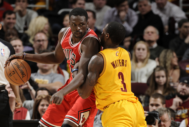 hi-res-452666529-luol-deng-of-the-chicago-bulls-backs-in-towards-the_crop_650 Trading Places: Cavs Acquire Former Bulls All-Star Luol Deng for Andrew Bynum 