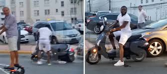 adrien-broner-crashes-his-scooter-into-a-parked-car-in-miami-video-HipHopSince1987.com-2014 Adrien Broner Crashes His Scooter Into A Parked Car in Miami (Video)  