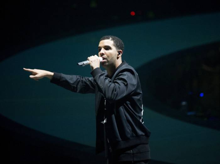 drake-on-stage Drake Cancels 2014 Wireless Festival Performance, Kanye West To Fill In  