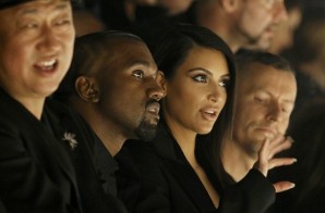 Kanye West & Kim Kardashian Get Boo’d By Hecklers At Paris Fashion Show (Video)