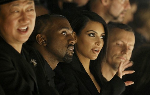 1411681861330_wps_28_TV_personality_Kim_Kardas-e1411875192622 Kanye West & Kim Kardashian Get Boo'd By Hecklers At Paris Fashion Show (Video)  