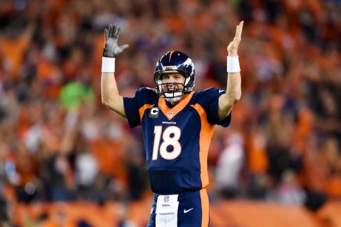 nfl Man Among Boys: Peyton Manning Breaks Brett Favre's NFL Touchdown Record 
