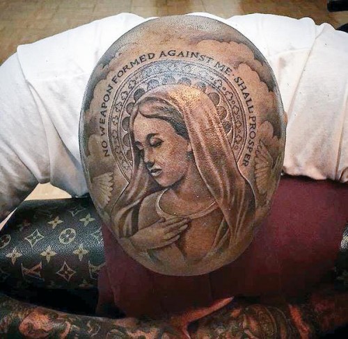 yg-500x488 YG Gets Huge Virgin Mary Tattoo On His Head!  