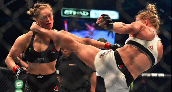 ron Rousey Rolled: Holly Holm Knocks Out Ronda Rousey With Chun Li Style Kick; Biggest Upset In UFC History (Video)  
