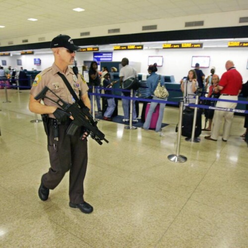 Cop-found-punching-Black-lady-in-the-face-at-Miami-airport-terminal-500x500 Cop found punching Black lady in the face at Miami airport terminal  