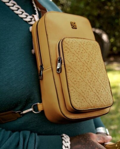 WhatsApp-Image-2025-08-11-at-1.32.39-PM-1-404x500 Rick Ross Debuts “Real Edition 22 Bags” in a Star-Studded, Invite-Only Fashion Extravaganza  